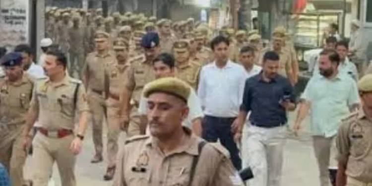 Sambhal High Alert: बकरीद को लेकर संभल में हाई अलर्ट, DM-SP ने भारी पुलिस बल के साथ किया पैदल मार्च 1 WhatsApp Image 2026 05 26 at 17.01.35 3